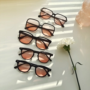 Chic sunglasses set with gradient lenses and elegant morning sunlight shadows