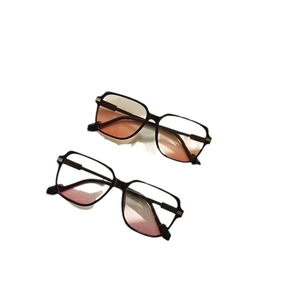 Fashionable oversized square sunglasses with black frames and gradient lenses for women