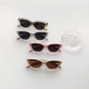 Retro cat eye sunglasses for kids in diverse colors like pearl white and soft pink