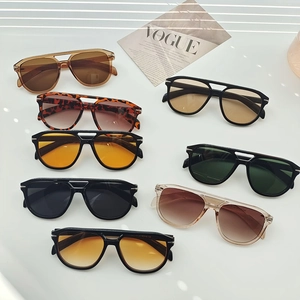 Matrix display of vintage double-bridge aviator sunglasses in multiple color options