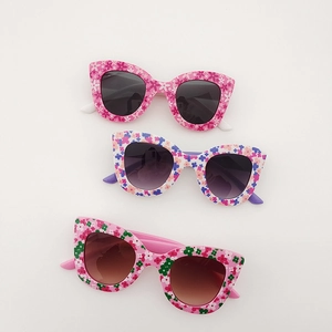Kids floral cat-eye sunglasses set with pink and white patterns and dark lenses