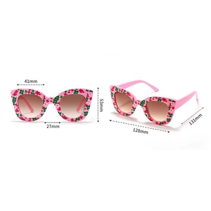 Detailed size chart for pink floral kids sunglasses with brown gradient lenses