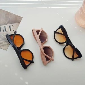 Retro triangle sunglasses set with wave textured temples on a minimalist white background