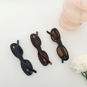 Kids oval frame sunglasses in black and leopard print with UV 400 protection