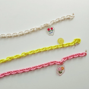 Détails de chaînes à lunettes colorées en acrylique avec pendentifs fleur et sourire