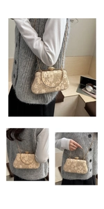 Close-up of floral lace evening bag with gold metal frame and pearl clasp detail