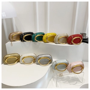Multi-color box clutch collection with C-shaped gold handles and delicate chain straps