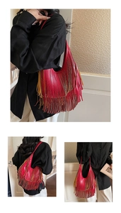 Detail showing two-tone red and yellow tassel shoulder bag with bohemian fringe style