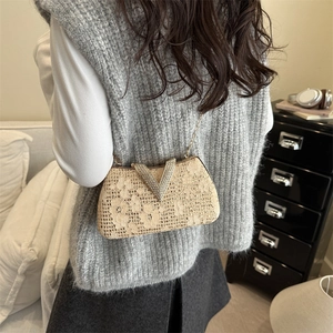 Elegant beige lace evening bag with rhinestone V-buckle and gold chain strap