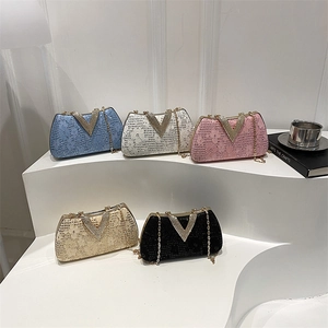 Elegant lace sequin evening bags with diamond V-clasp in five colors on white pedestals