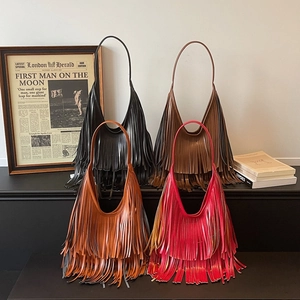 Hobo bucket bags with long fringes in black, brown, caramel, and fuchsia colors