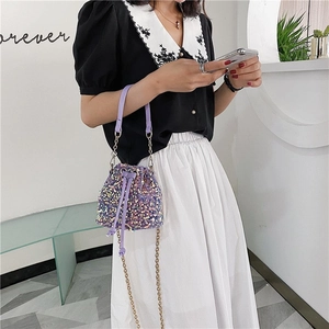 Fashionable purple sequin bucket bag with drawstring and golden chain strap for women
