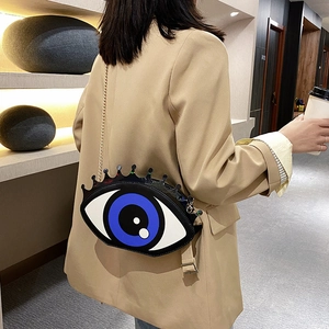 Petit sac bandoulière rond en PU pour femme avec motif œil et chaîne dorée