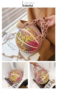Detail of creative basketball-shaped crossbody bag with street graffiti and pink chain