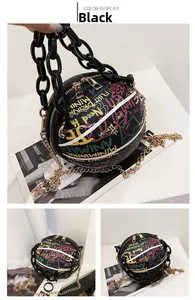 Close-up of black basketball-shaped bag with colorful street graffiti and chunky chain