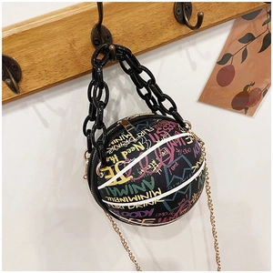 Macro detail of graffiti basketball bag featuring chunky plastic chain and metal strap