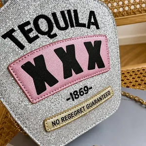 Detail shot of the silver glitter texture and Tequila embroidery on the chain bag