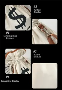 Detailed views of canvas drawstring bag featuring dollar sign print and metal hardware