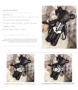 Detail view of the black PU leather skeleton bear backpack showing size comparison with iPad