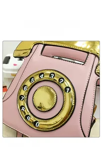 Détails du sac design téléphone rétro en cuir rose avec cadran rotatif doré brillant