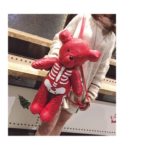 Gothic red teddy bear backpack featuring white bone prints and punk style stitching detail