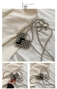 Detail of Style 6 mini heart-shaped woven pearl bag with silver and black metallic beads