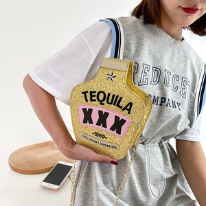 Creative gold sequined tequila bottle crossbody bag with chain and striped strap