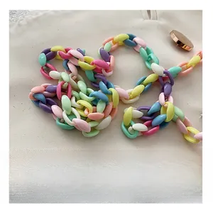 Detail showing pastel acrylic link chain strap for summer fairy bags in multi-color finish