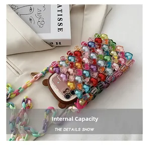 Detail view of colorful heart-beaded phone case with macaron acrylic chain strap
