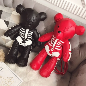 Gothic punk bear backpack in red and black faux leather with white skeleton pattern design
