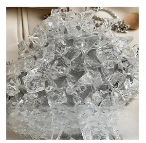 Macro shot of silver-gray bag featuring acrylic crystal ice textures and metal chain