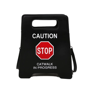 Sac à main trapèze noir original avec design de panneau de signalisation Caution