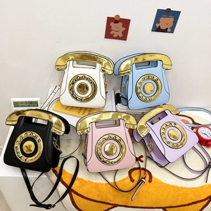 Sacs à bandoulière vintage en forme de téléphone rétro en cinq coloris variés