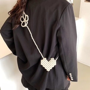 Chic heart-shaped pearl woven crossbody bag with decorative floral beaded strap