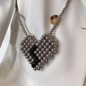 Mini heart-shaped woven metal bead crossbody bag with silver and black Y2K punk style
