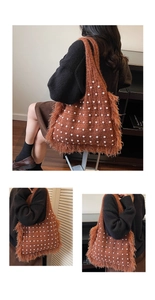 Detail of brown knitted tote bag with white pearl beads and soft faux fur trim