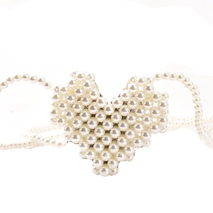 Chic heart-shaped pearl woven crossbody bag with elegant chain strap for women