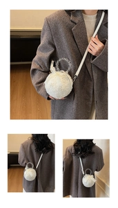 Detailed view of white faux fur round bag with beaded handle and silky bow detail