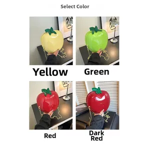 Collage of apple shaped crossbody bags in yellow, green, red, and dark red finishes