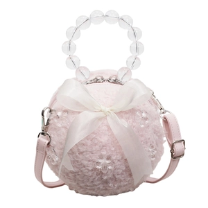 Pink plush spherical handbag with a satin bow and transparent beaded handle for women