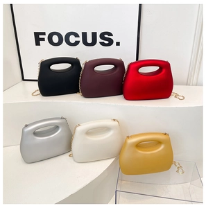 Collection of six modern acrylic candy-colored evening bags with gold chain straps