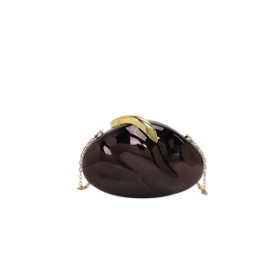 Luxe dark brown acrylic evening clutch with gold chain strap and pebble-shaped design