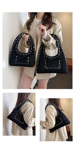 Detail view of black matte hobo bag featuring silver punk rivets and a bohemian style