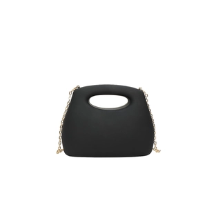 Minimalist black matte acrylic clutch bag with a sleek semi-circular design and gold chain strap
