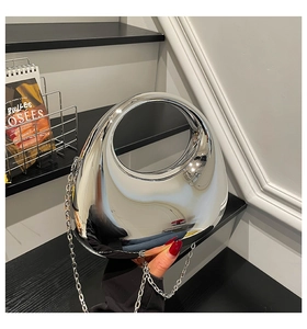 Silver mirror acrylic crescent bag with metal chain handle and futuristic egg shape finish