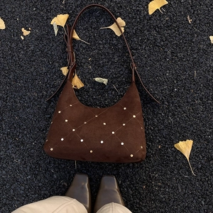 Matte brown half-moon hobo bag with gold rivet diamond pattern for autumn winter