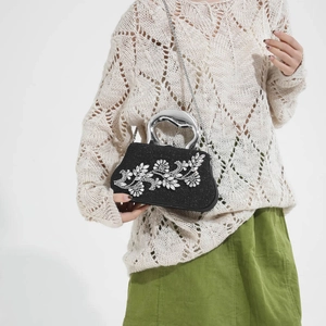 Elegant black evening bag with silver crystal flower pattern and metal handle