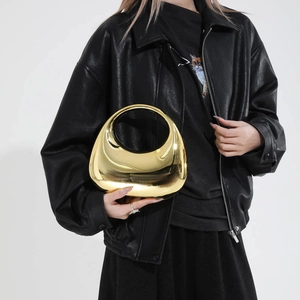 Modern gold metallic geometric handbag with high-gloss mirror finish for women