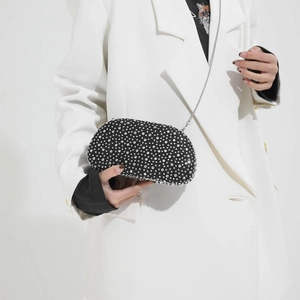 Elegant black evening clutch with sparkling crystals and silver chain strap for women