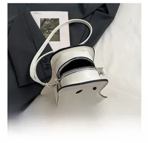 Detailed top view of ghost-shaped crossbody bag showing metal zipper and inner storage